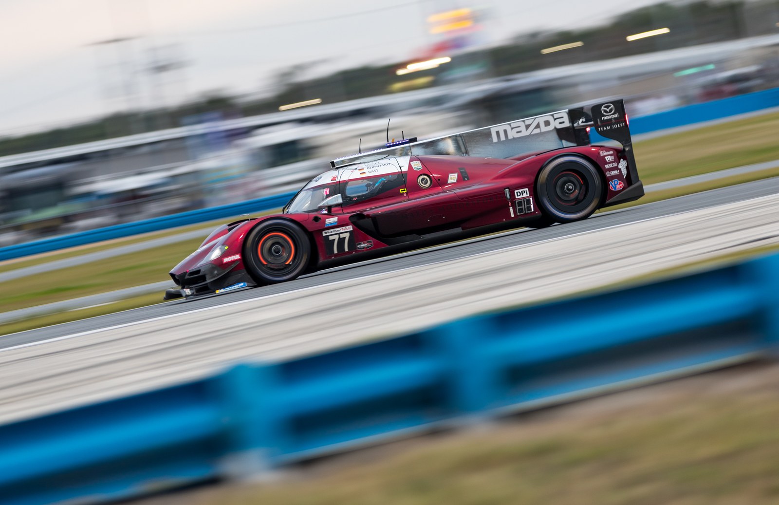 Prototype race car on the banking, motion blurred